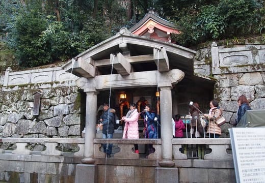 Visitors collecting water from the three streams of the Otowa waterfall at Kiyomizu-dera