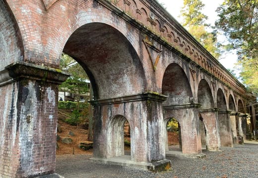 The red brick arches of the Suirokaku aqueduct running through the grounds of Nanzen-ji