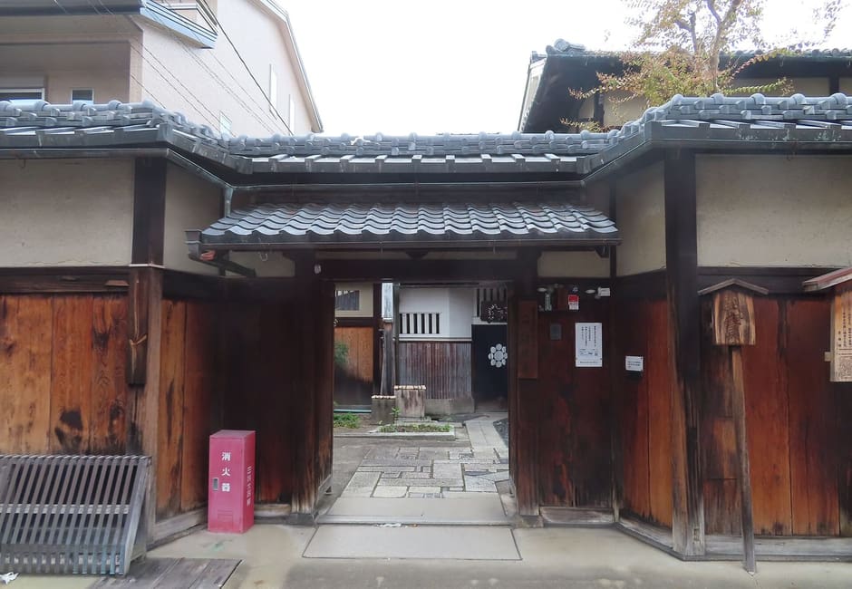 The wooden entrance gate of the Nijo Jinya residence in Nakagyo, Kyoto