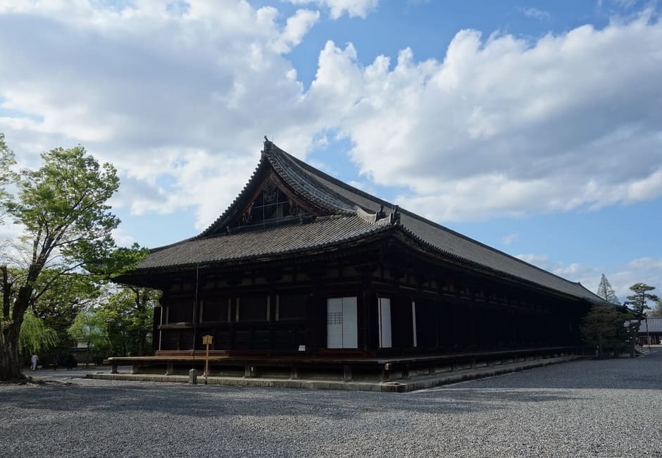 The 120 metre long wooden hall of Sanjusangen-do seen from the grounds