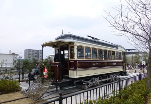 A preserved Kyoto city tram on display in Umekoji Park, Kyoto